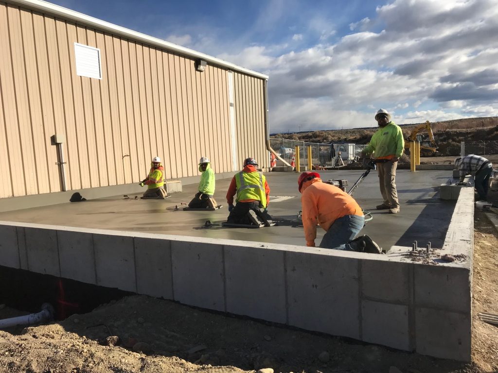 Laying foundation for metal building construction