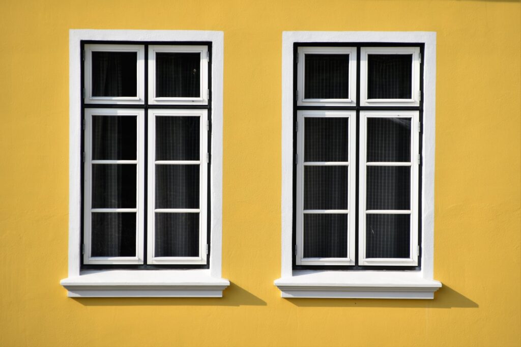 closed white wooden framed glass windows